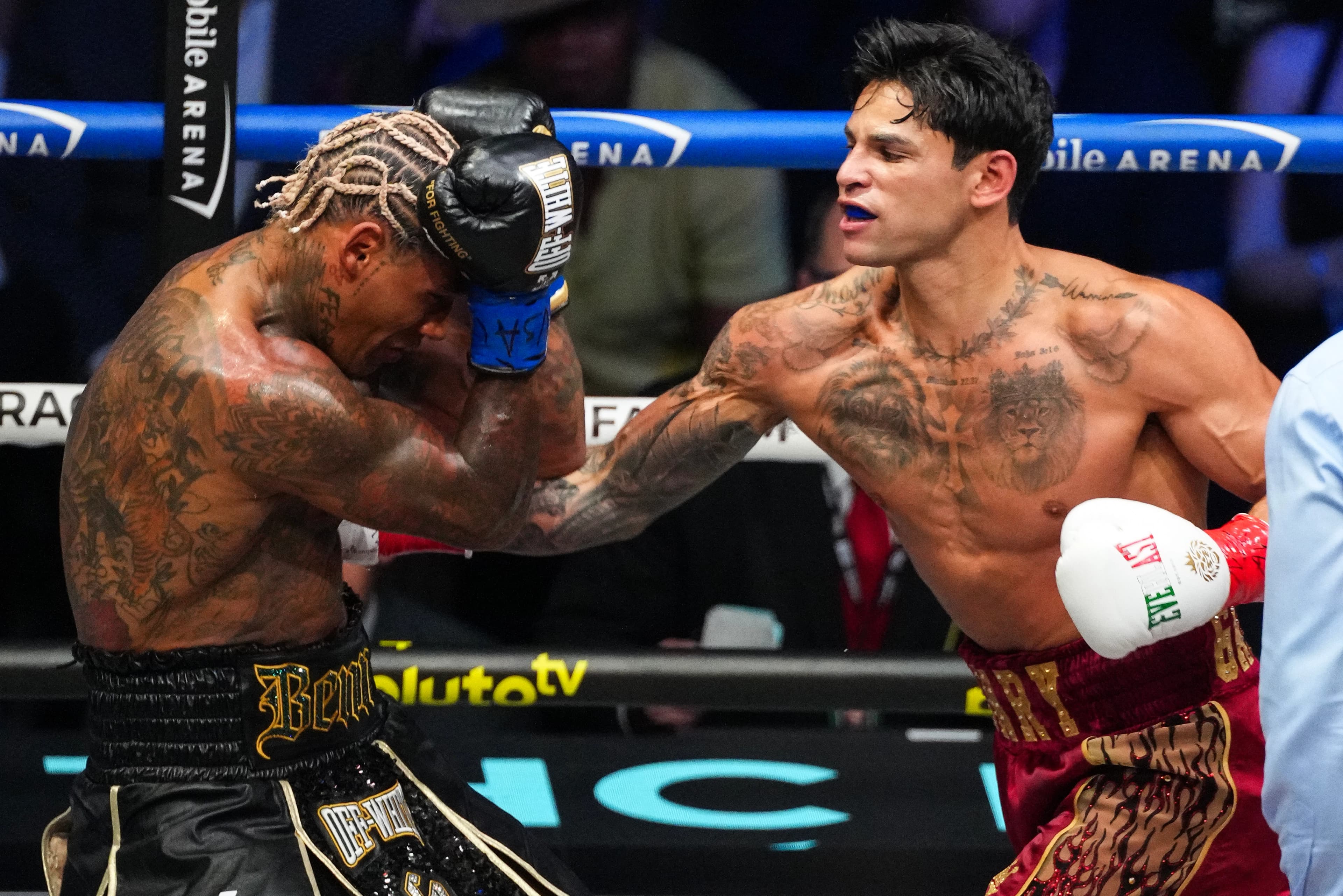 Relive the action as Garcia TKOs Benn in championship clash
